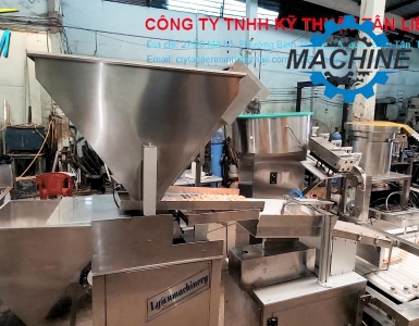 Máy vào viên sủi đóng nắp tuýp 